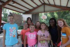 Students and children at camp.